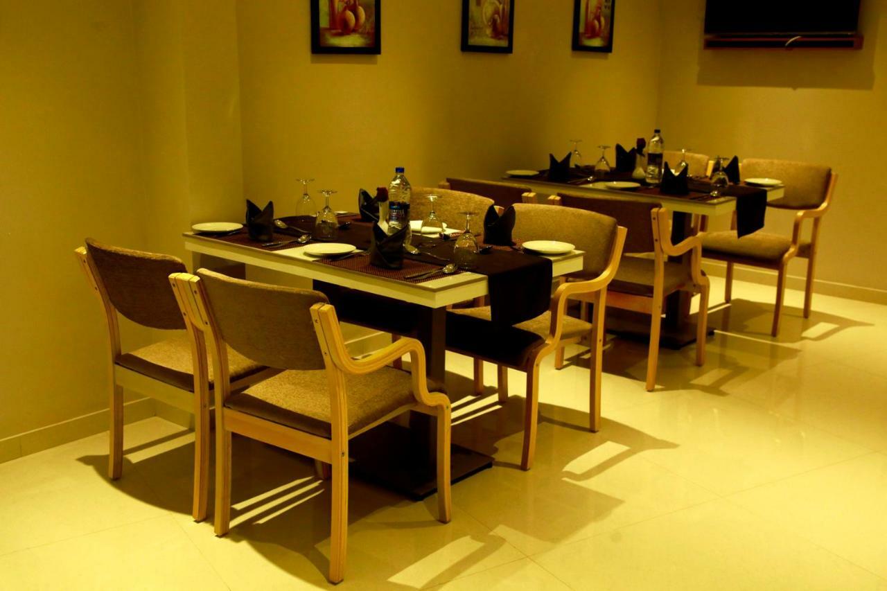 Hotel Panacea Ventures Kollam Bagian luar foto